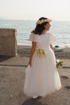 Ritratto naturale di Camilla durante la Prima Comunione a Marina di Stabia, reportage fotografico Comunione Napoli